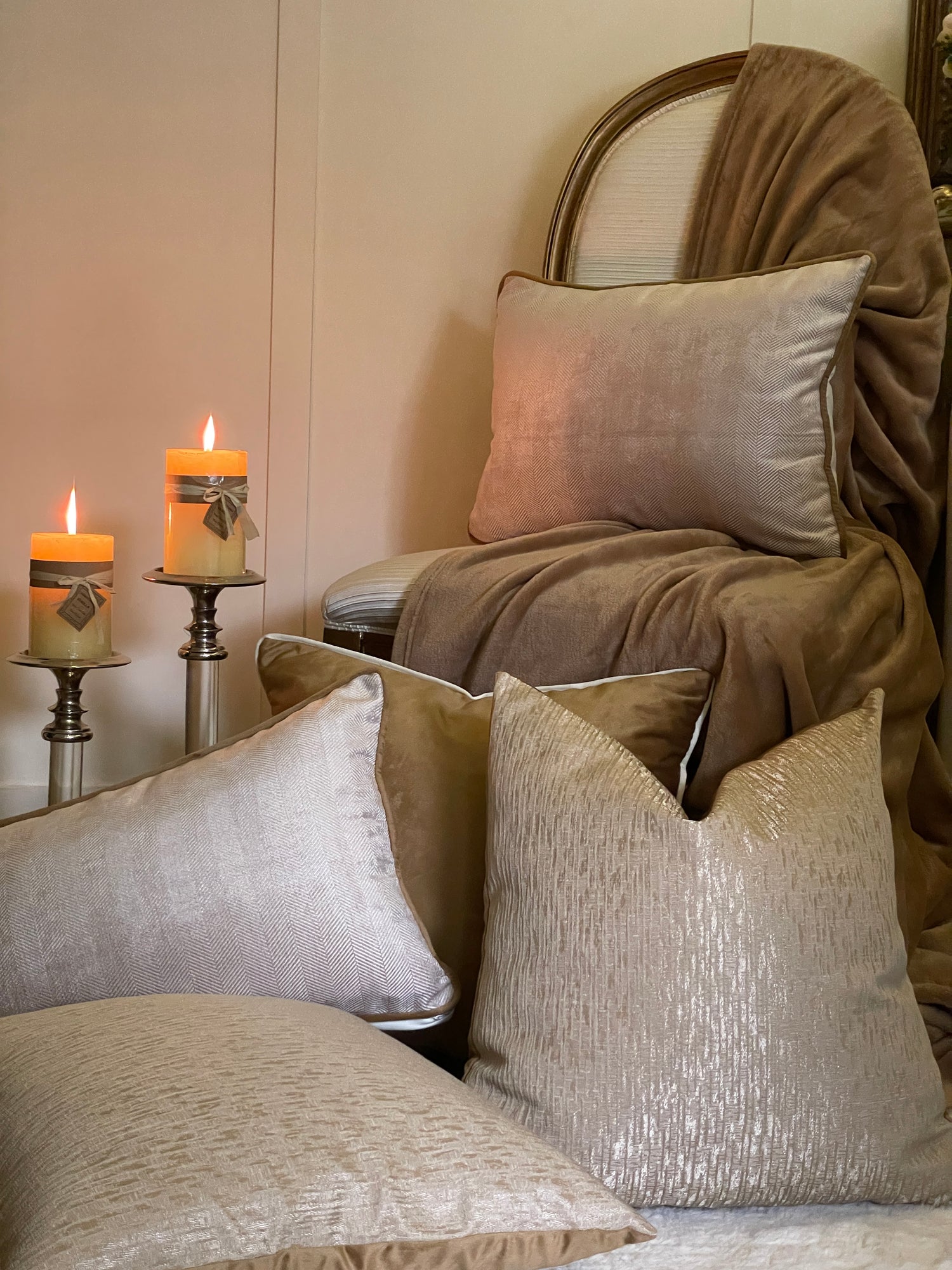 Gold and ivory pillows as neutrals for a formal sitting