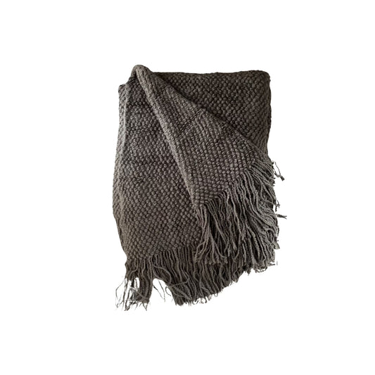 Charcoal grain-waffle boucle blanket with thick tassle detailing 