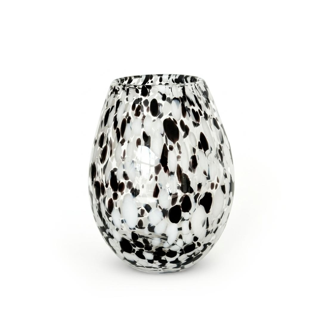 The Confetti Glass Vase, a rounded clear glass vase dappled black and white in a terrazzo pattern